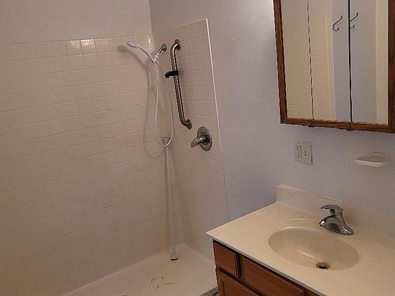 HANDICAP SHOWER, VANITY AND TOILET