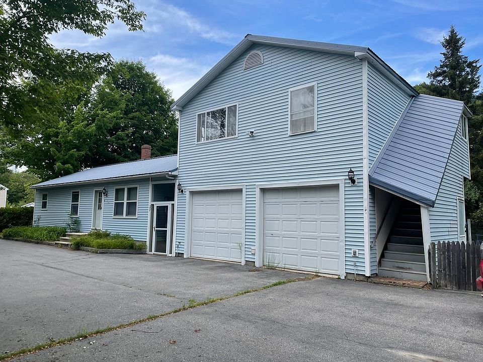 View of Garage, Apartment, and Main House