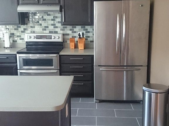 New Flooring. New Dishwasher. Double Oven. 3-year-old Refrigerator.