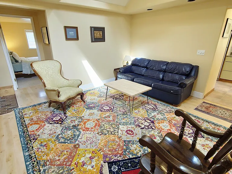 Airy living room with Roku TV, WiFi and comfy furniture.