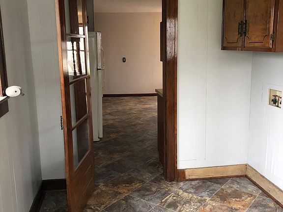 From back door through utility room to the kitchen