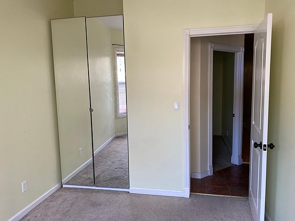 Front bedroom closet and entry