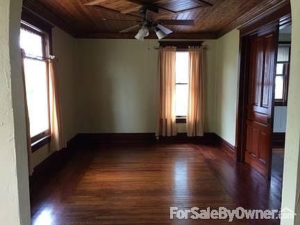 Living Room
						:
						Refinished hardwood floors, newer ceiling fan and custom ceiling. Pocket door.