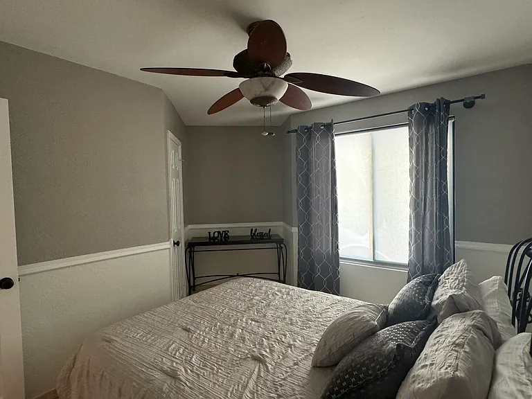 FURNISHED. 1st. Guestroom. Walk-in closet, room for a desk, queen size bed.