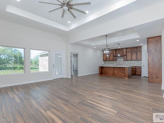 2nd image of 9400 N Queen Palm