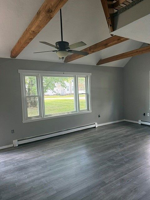 Living room with exposed beams.
