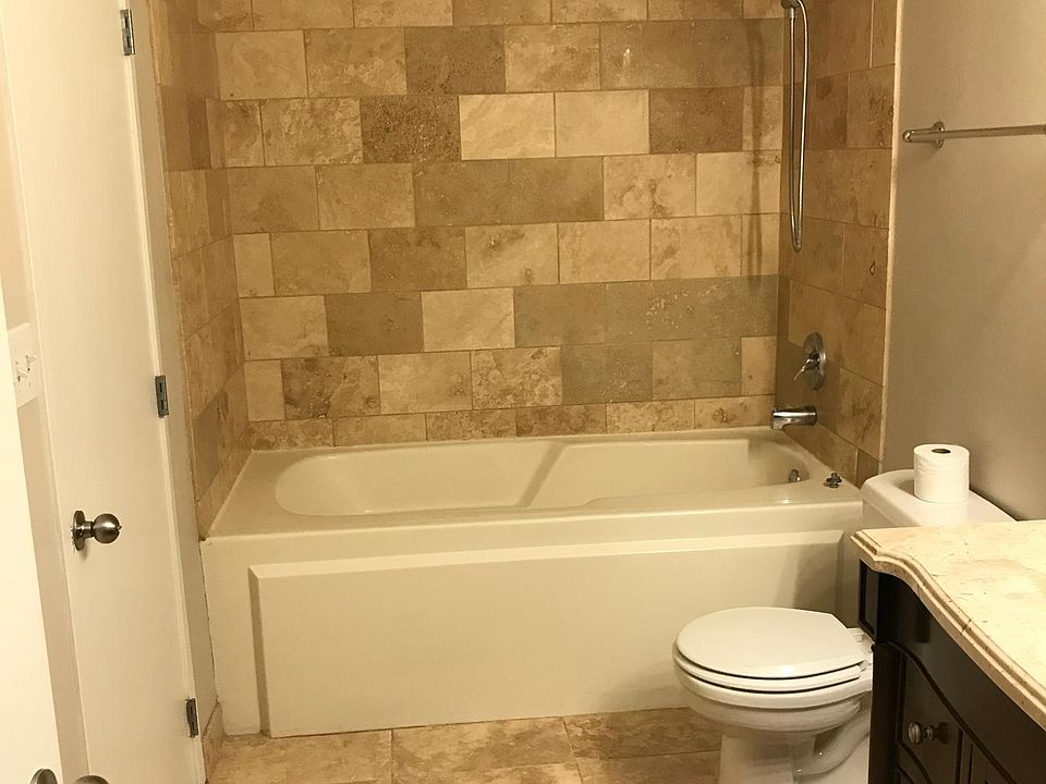 large Mater bathroom with a large vanity.