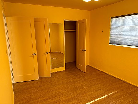 Bedroom 2: Full bedroom, view to the north and west. Full -length closet (10 ft) with two doors, mirror. This is the largest bedroom, about 13x10.