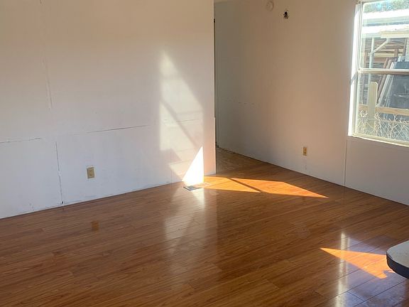 Living Room with real wood flooring