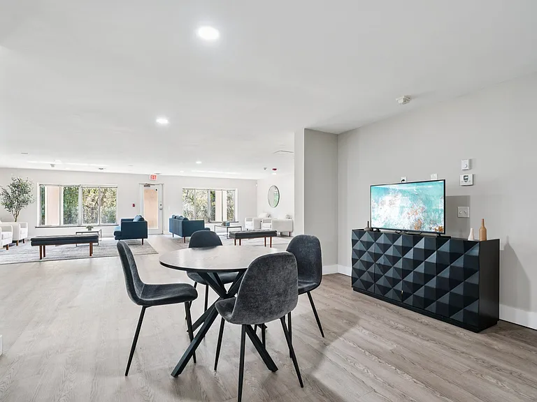 Spend time with friends in our modern lounge featuring entertainment and comfortable seating areas, professionally operated by Highlands Vista Group.