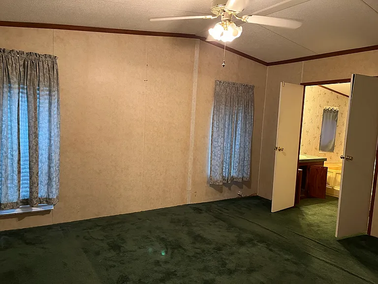 Master bedroom with double doors leading into the master bathroom!