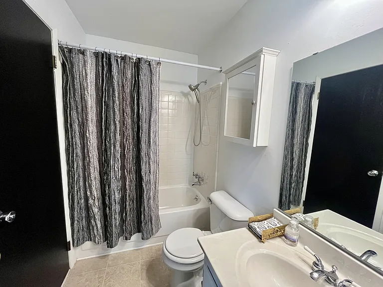Dual-entry bathroom