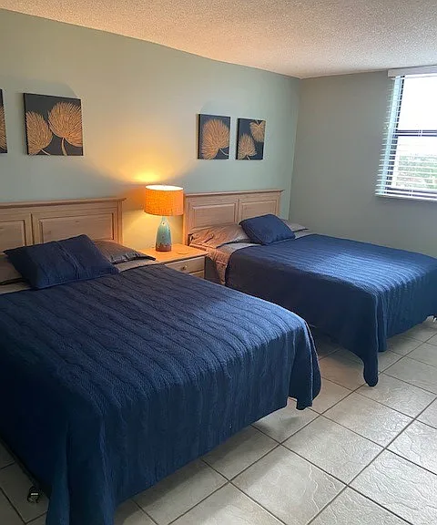 Master bedroom with 2 queen beds