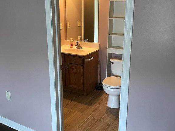 view from master bdrm into master bath