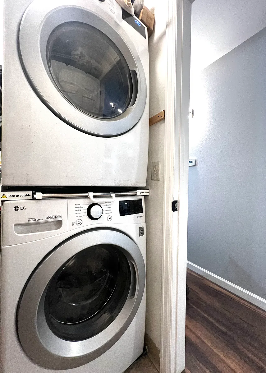 Full sized stack washer and dryer in utility room - 4650 White Rock Cir #5