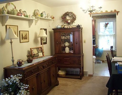Formal dining room adjacent to living room.