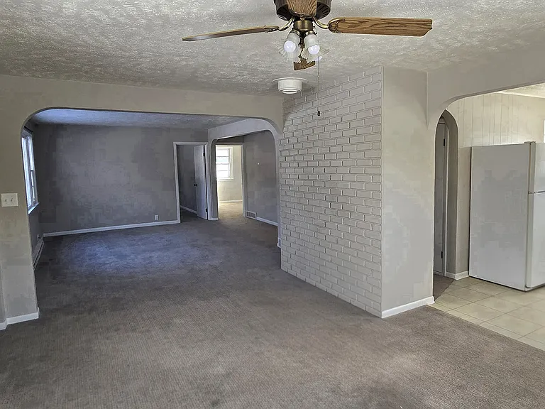 kitchen, dining room looking into living room