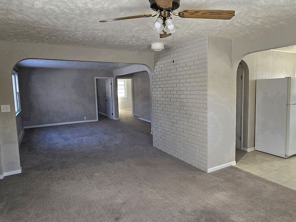 kitchen, dining room looking into living room