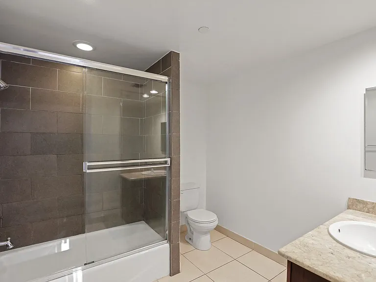 Spacious Bathroom with Full-Size Bathtub