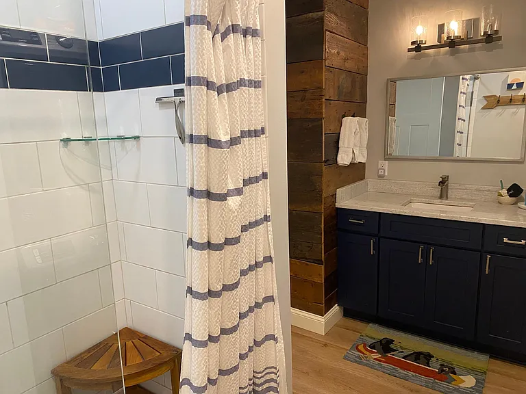 Walk in tiled Shower, large vanity, W/D.