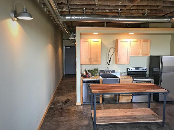 Handmade island doubles kitchen space