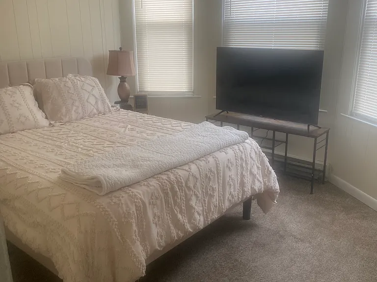 Ample Size Bedroom with new carpet