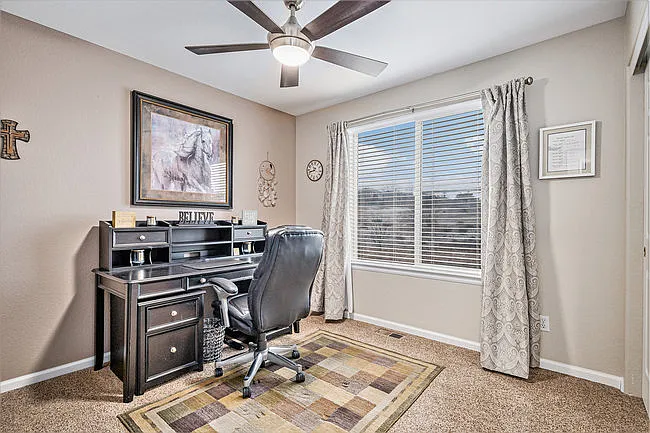 third bedroom set up as office with views of expansive open space
