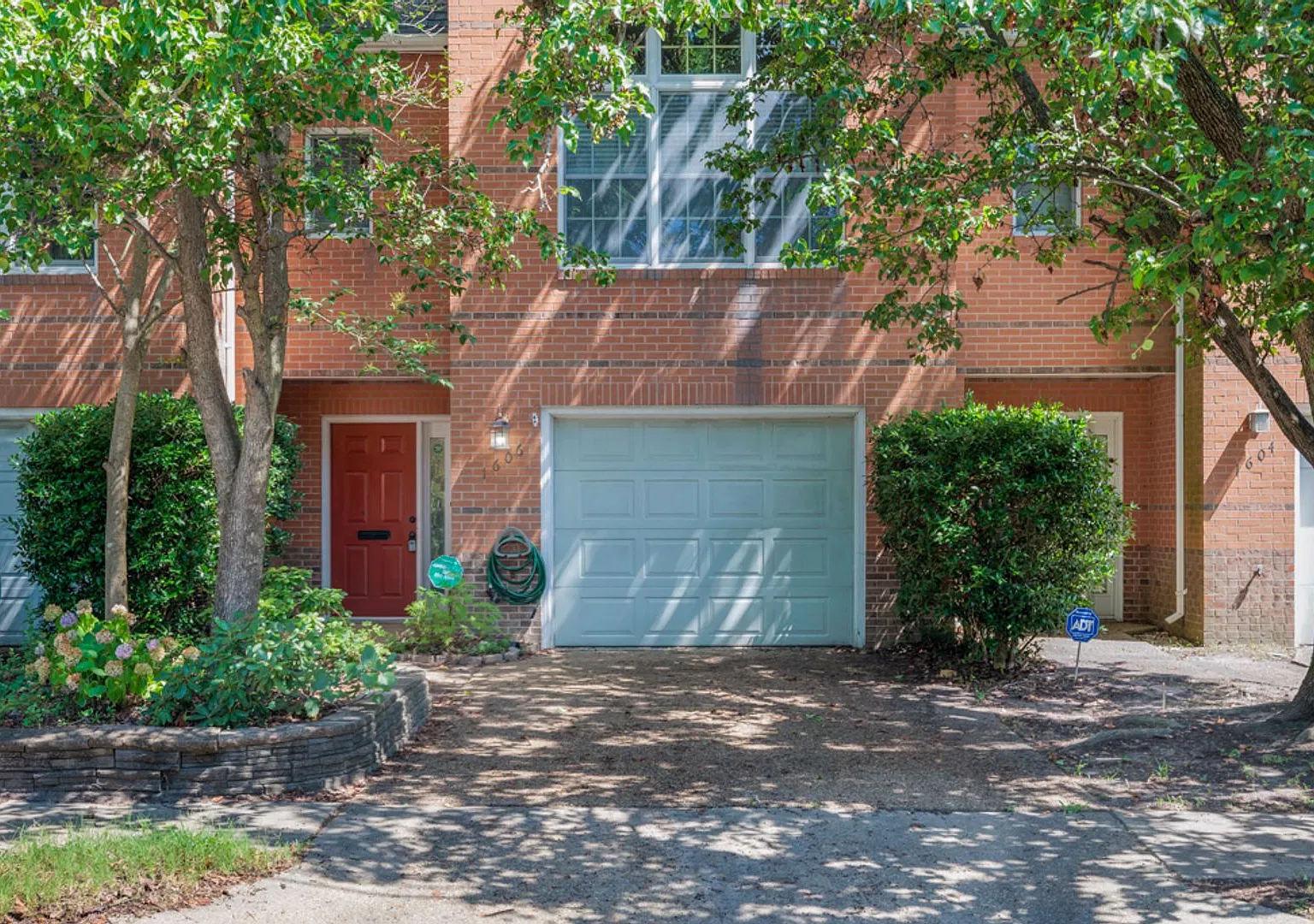 Beautifully maintained 3-bedroom, 2.5-bathroom townhome offering comfortable living in the conven... — Photo 1