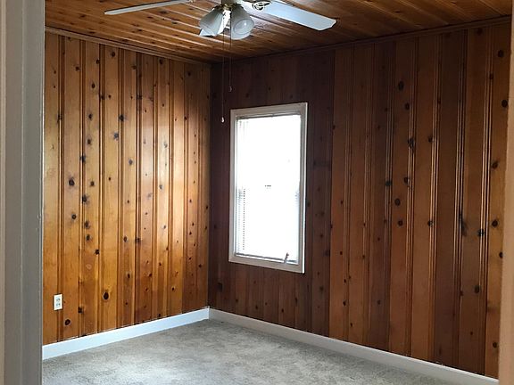 2nd bedroom is knotty pine.