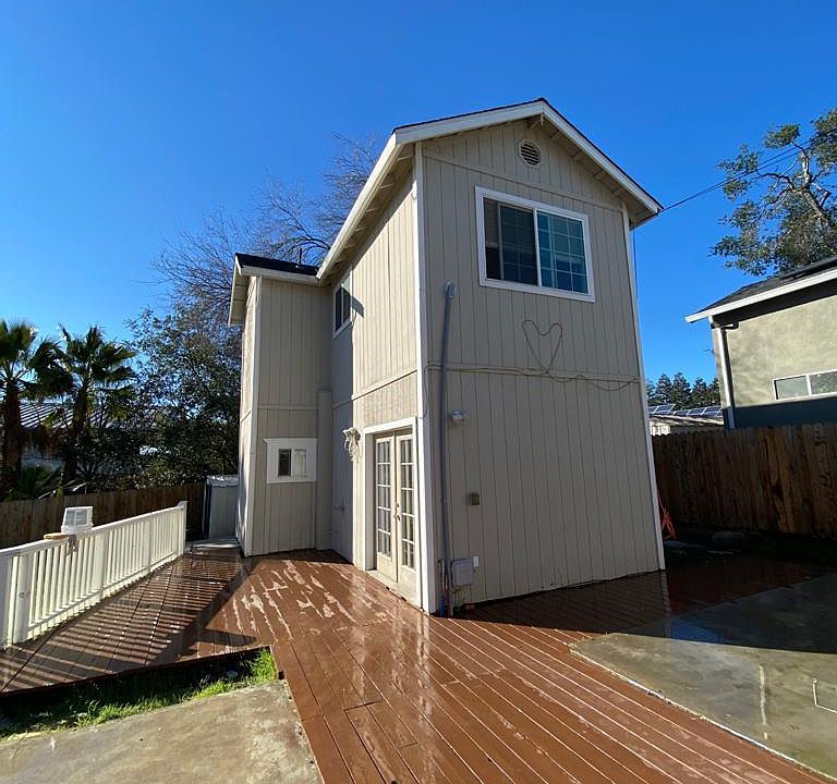 Outside view of unit. Unit is upper level.