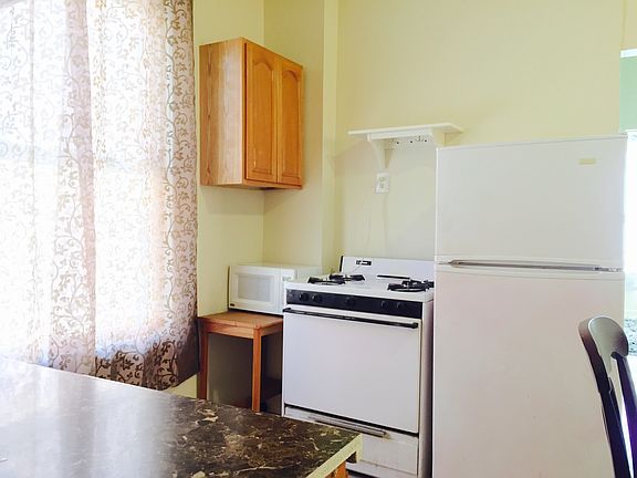 5th image of 829 E 220th St APT 2