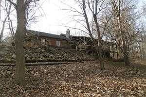 Log home with attached garage