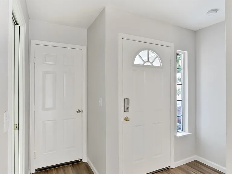 Looking back at the front door & garage door