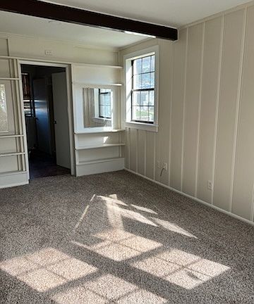 master bedroom with built in shelves