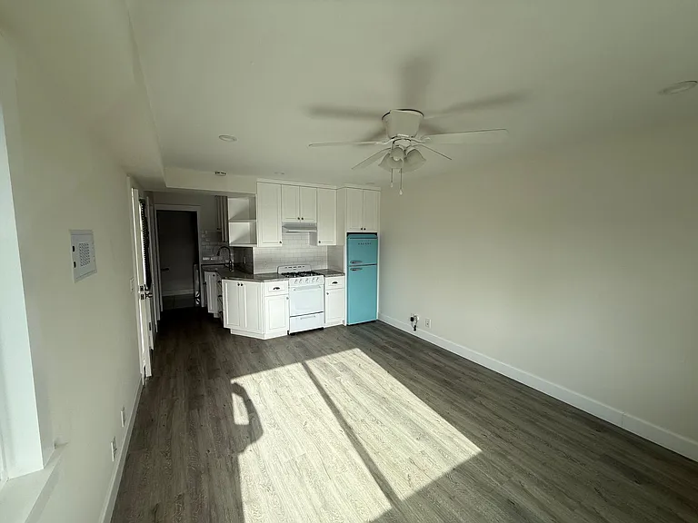 Open-concept layout connecting kitchen and living space