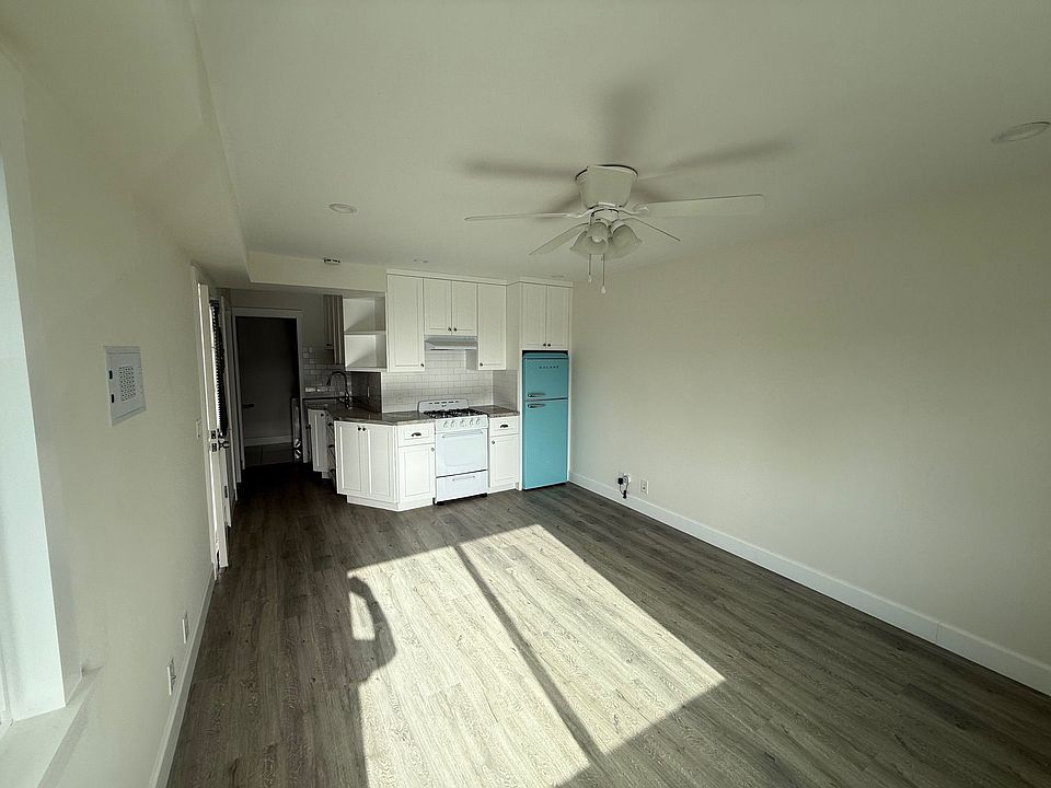 Open-concept layout connecting kitchen and living space