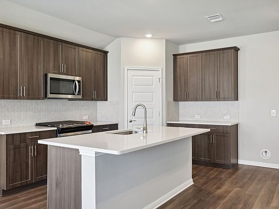 Cook a delicious meal in this beautiful kitchen.