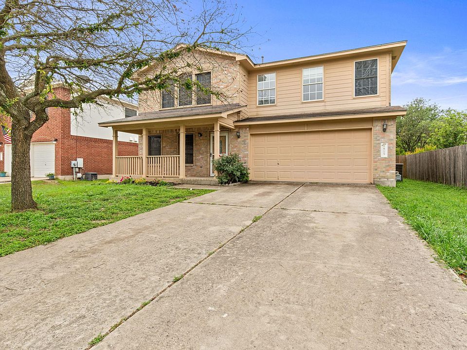 2 car garage plus plenty of driveway space.