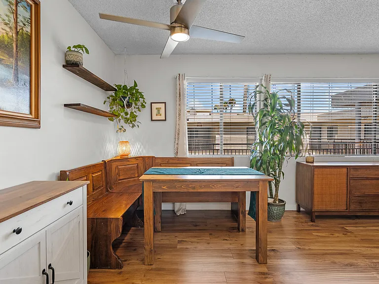 The dining area is equipped with a banquette that adds character as well as concealed storage. This can also be removed upon request.