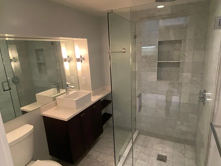 Carrara Marble remodeled bathroom