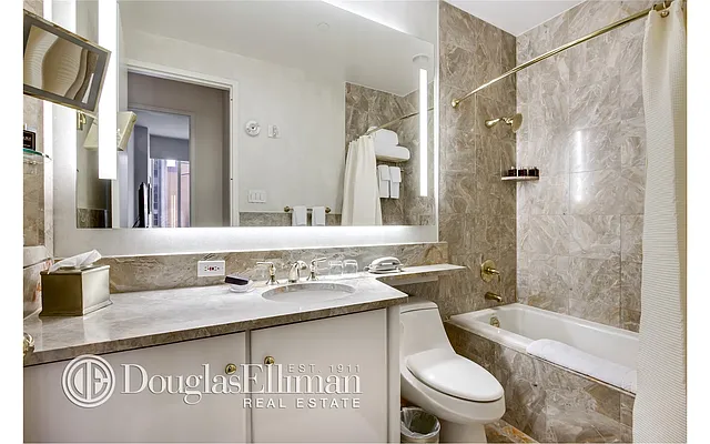 Sold by Douglas Elliman | media 18