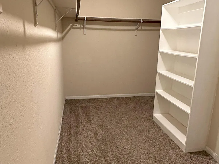 spacious master bedroom closet