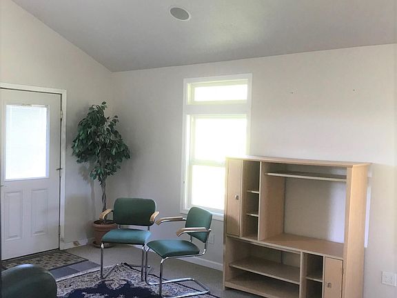 Looking across living area from kitchen pass-through