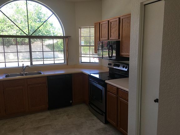 Kitchen with all appliances, new sink, disposal, faucet, and