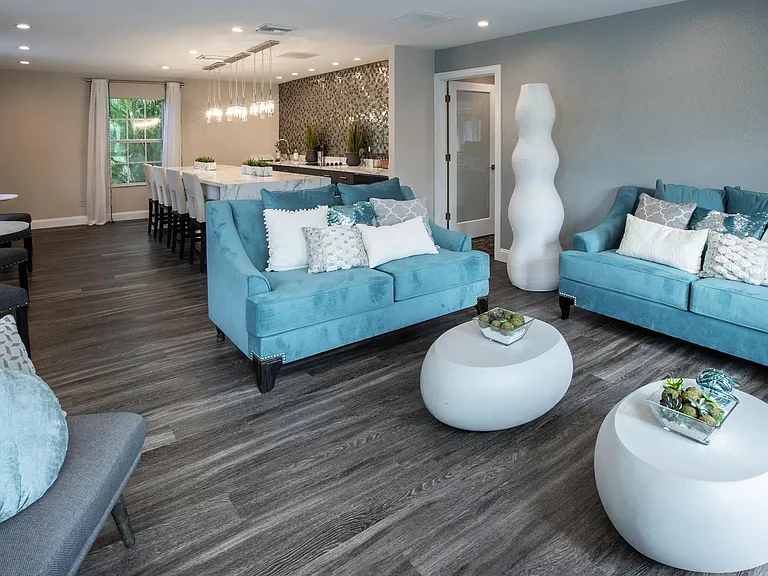 Discover the heart of community life in our inviting clubroom, a space designed for dynamic resident events and delightful gatherings at River Reach.