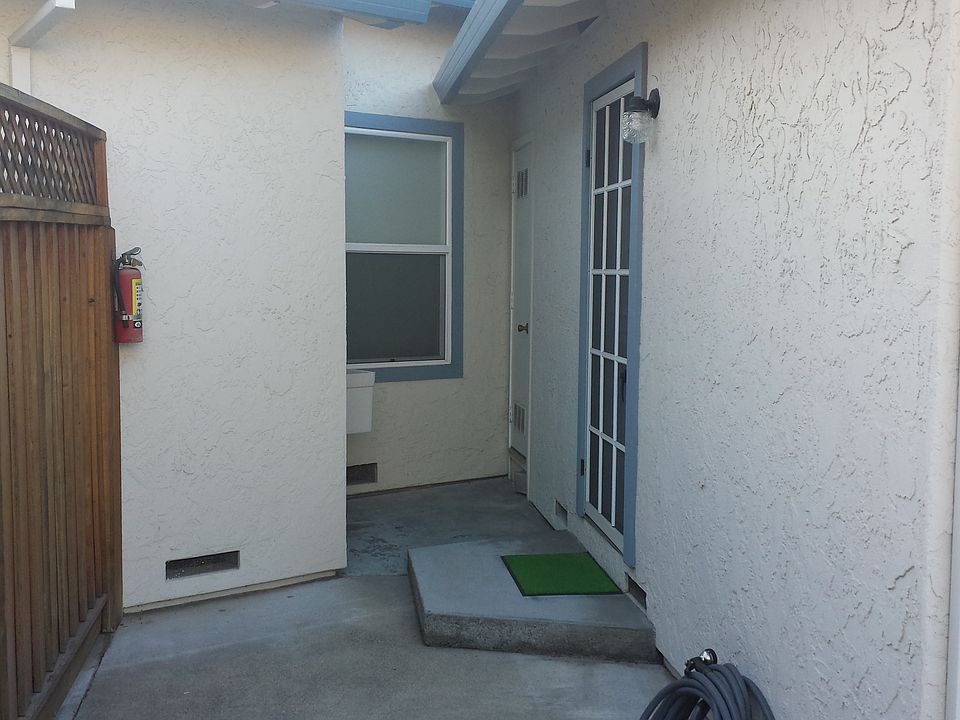 A secure and private entrance. It has a screen door to allow a cross breeze and keep the bugs out.