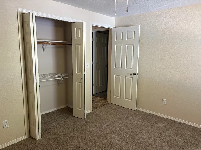 Bedroom #2 with view of back yard.