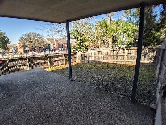 Covered back patio and yard