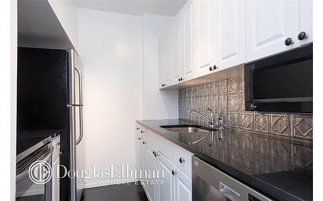 Sold by Douglas Elliman | media 11