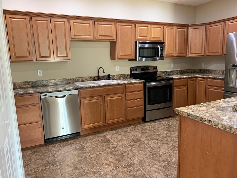3 Bedroom Kitchen - All stainless steel high efficiency appliances are included - Refrigerator, stove, microwave and dishwasher. Ceramic tile floor. Lots of counter space and storage.